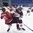 POPRAD, SLOVAKIA - APRIL 14: Latvia's Rudolfs Builis #11 bodychecks Switzerland's Mick Schupbach #10 during preliminary round action at the 2017 IIHF Ice Hockey U18 World Championship. (Photo by Andrea Cardin/HHOF-IIHF Images)

